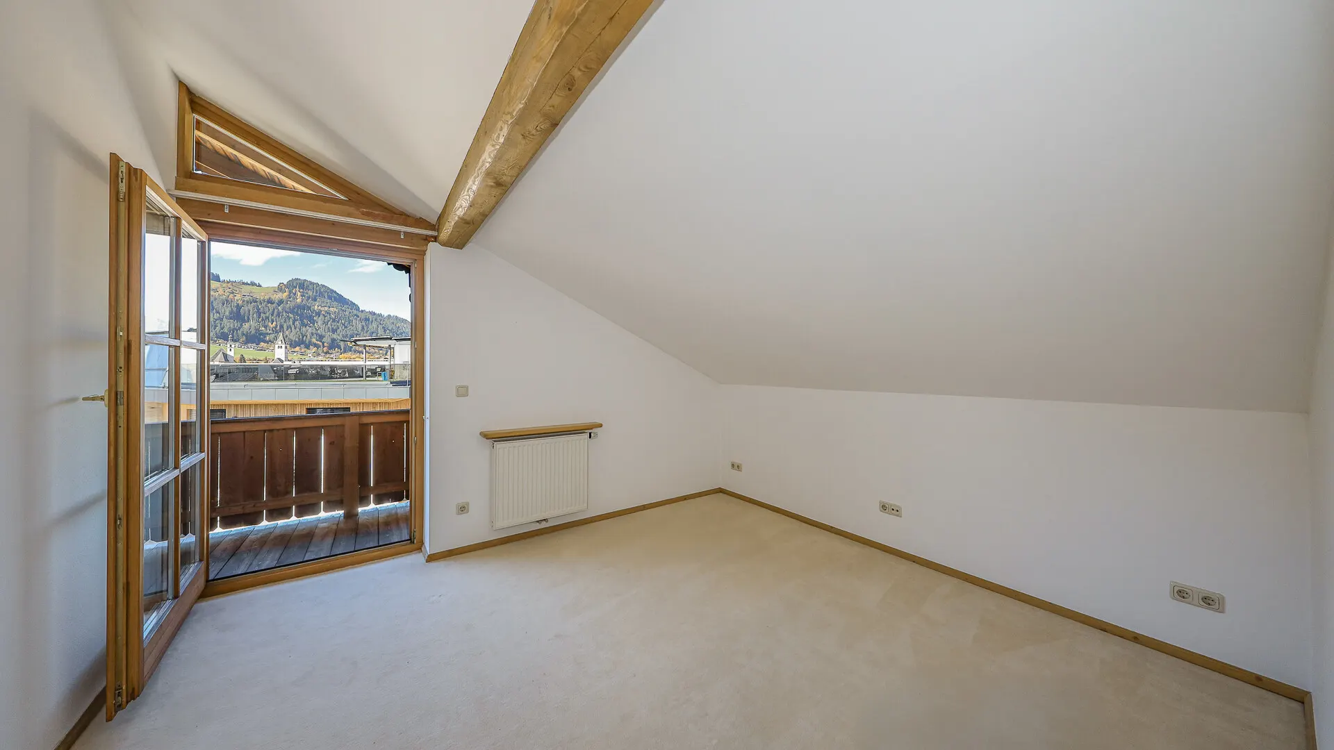 KITZIMMO-Dachgeschosswohnung in Toplage am Sonnberg kaufen - Immobilien Kitzbühel.