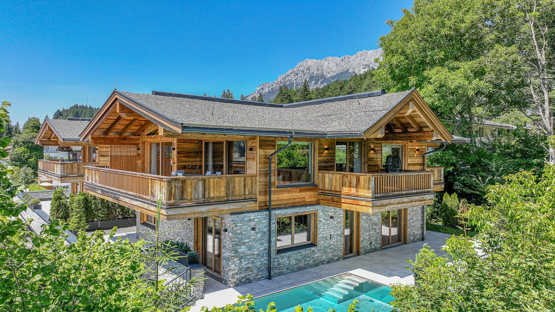 KITZIMMO-Luxus-Neubauvilla mit Pool in Toplage kaufen - Immobilien Ellmau.-1