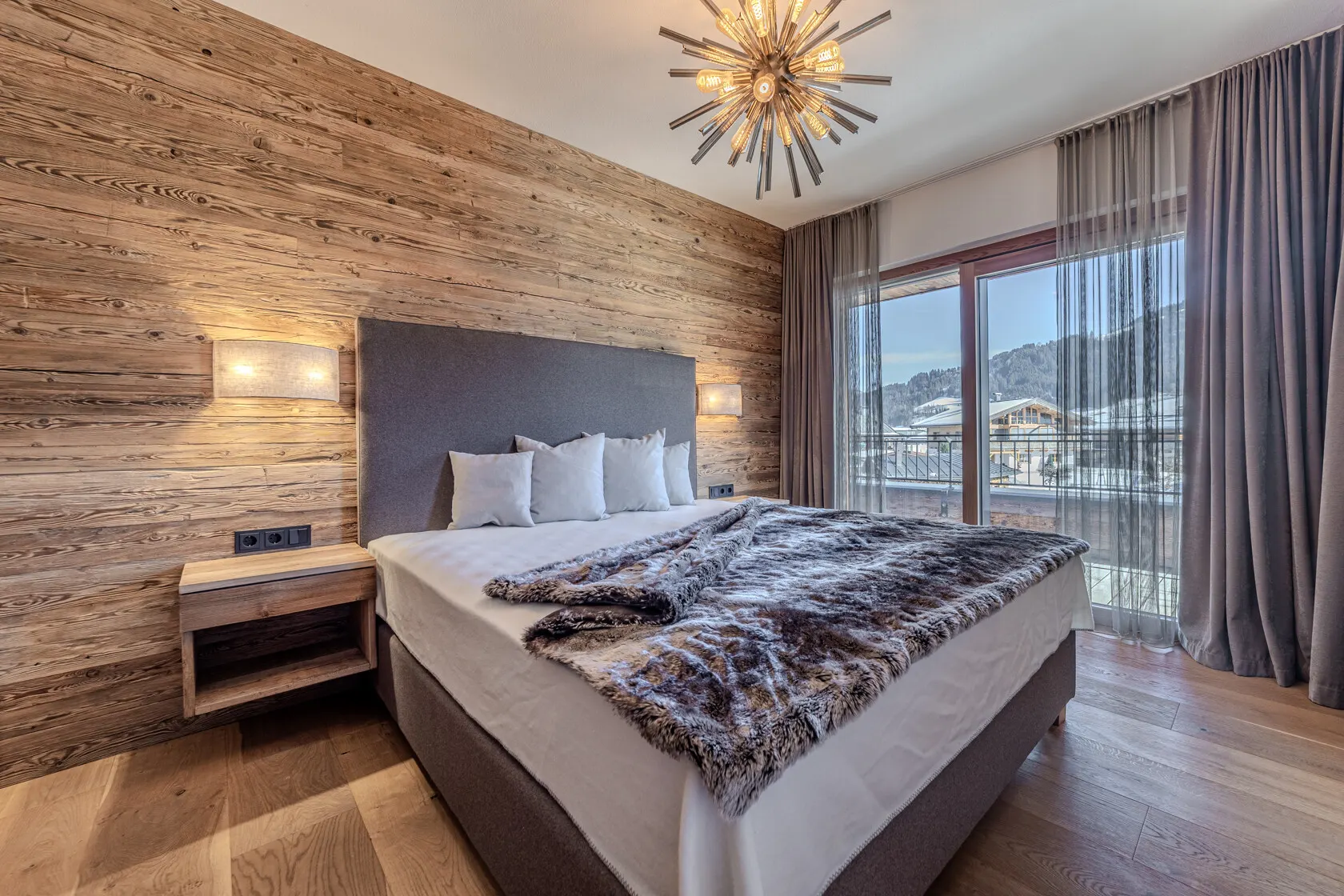 KITZIMMO-Luxuswohnung mit Kaiserblick in Toplage kaufen - Immobilien Oberndorf.