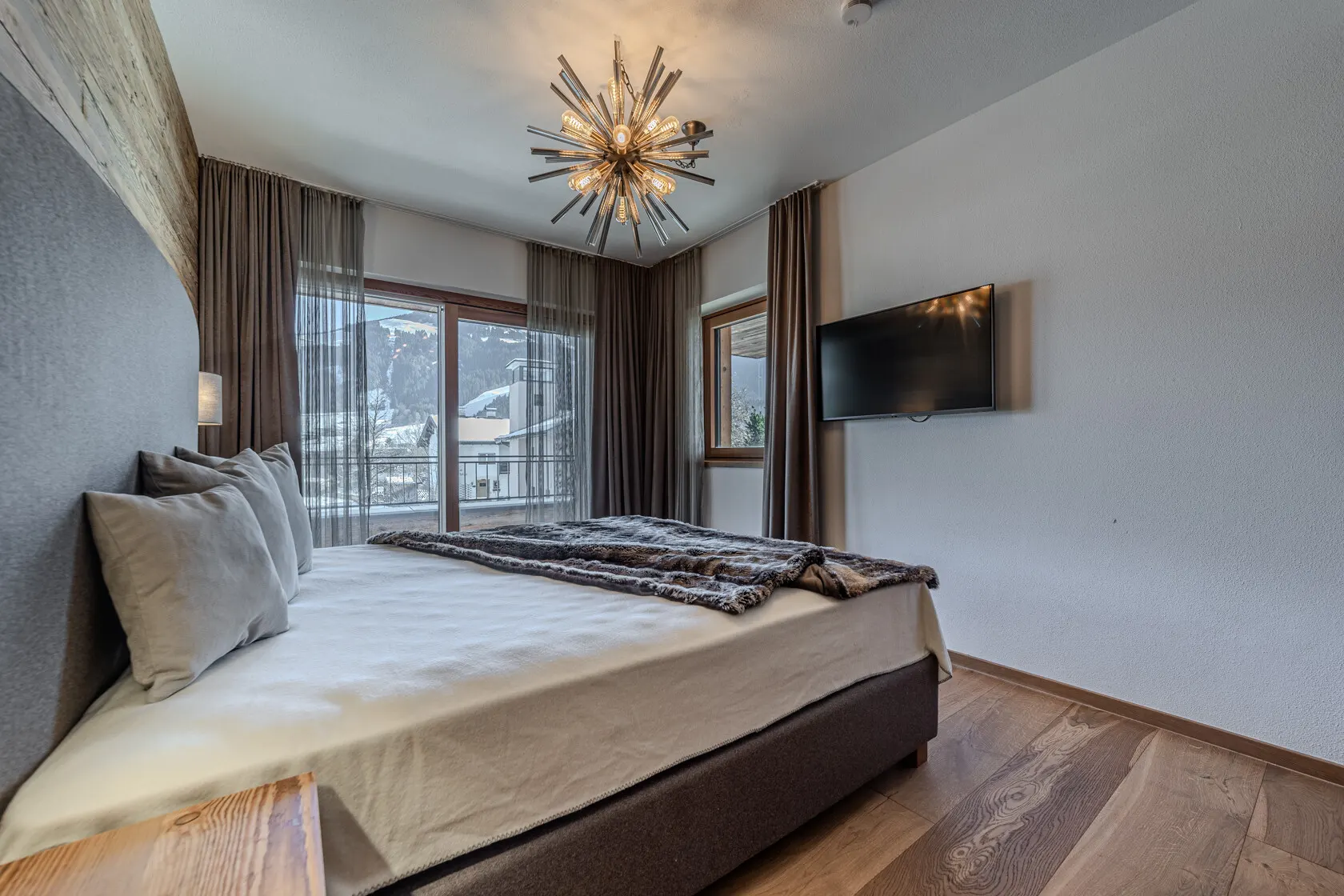 KITZIMMO-Luxuswohnung mit Kaiserblick in Toplage kaufen - Immobilien Oberndorf.