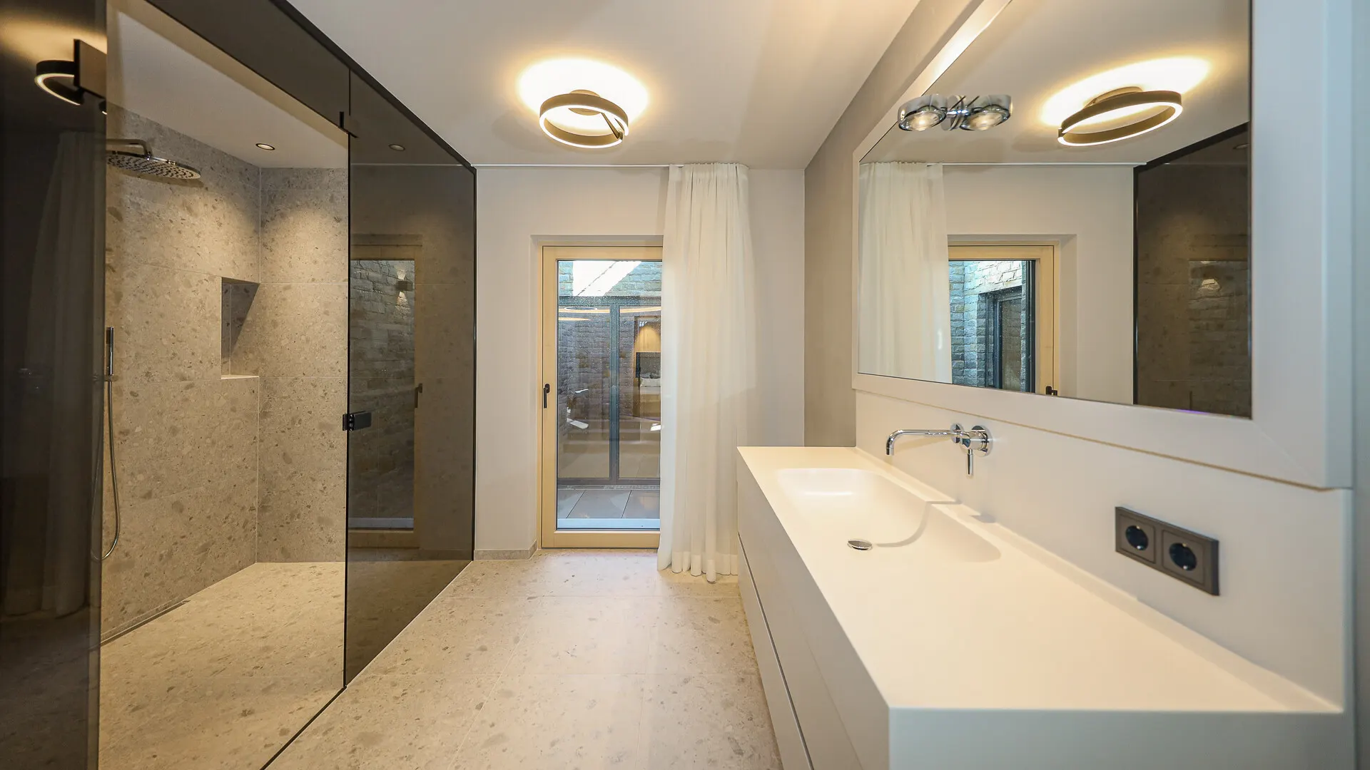 KITZIMMO-Luxuriöse Gartenwohnung mit eigenem Wellnessbereich - Immobilien Brixen.