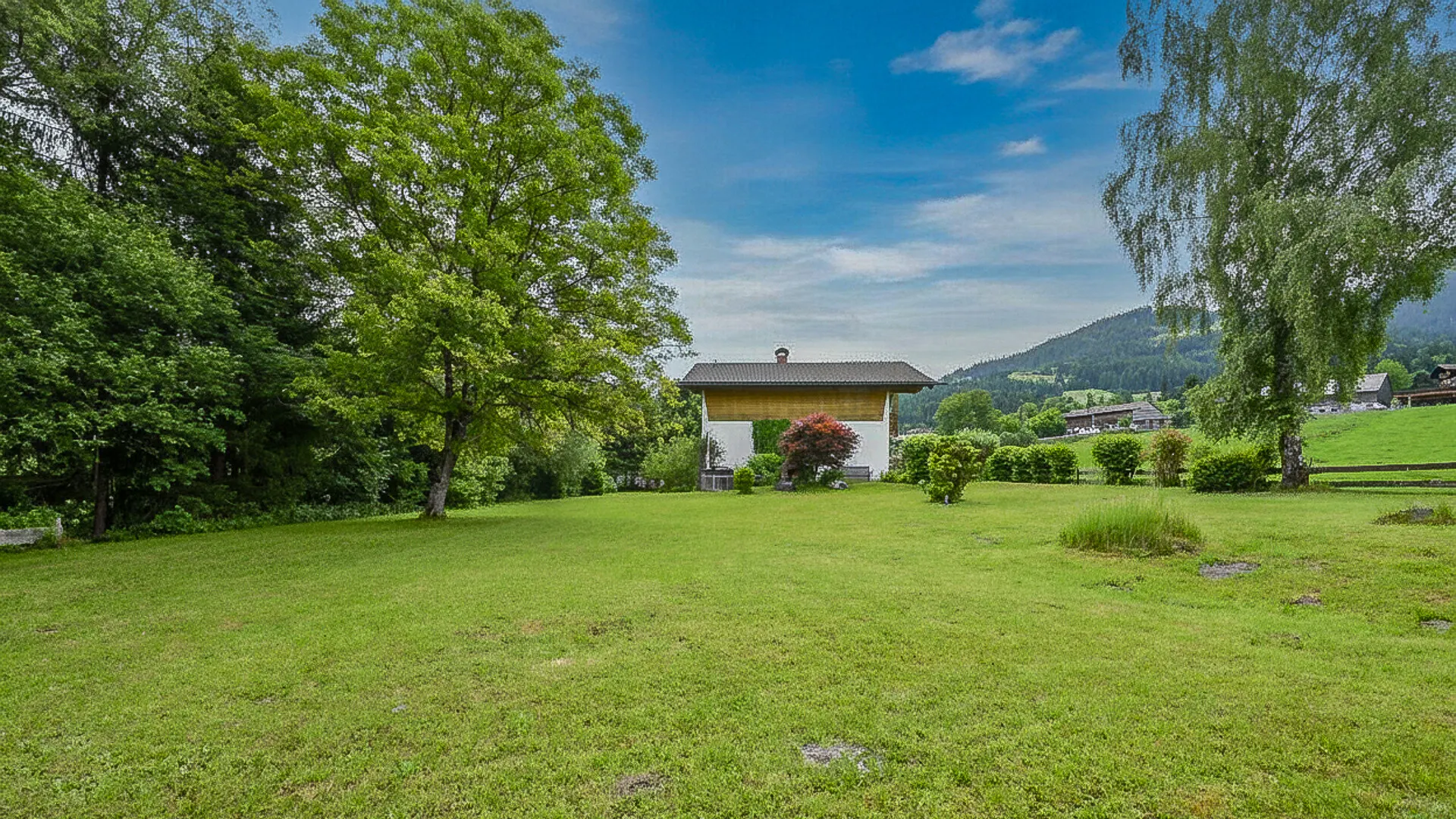 KITZIMMO-Einfamilienhaus mit großem Grundstück kaufen - Immobilien Söll.