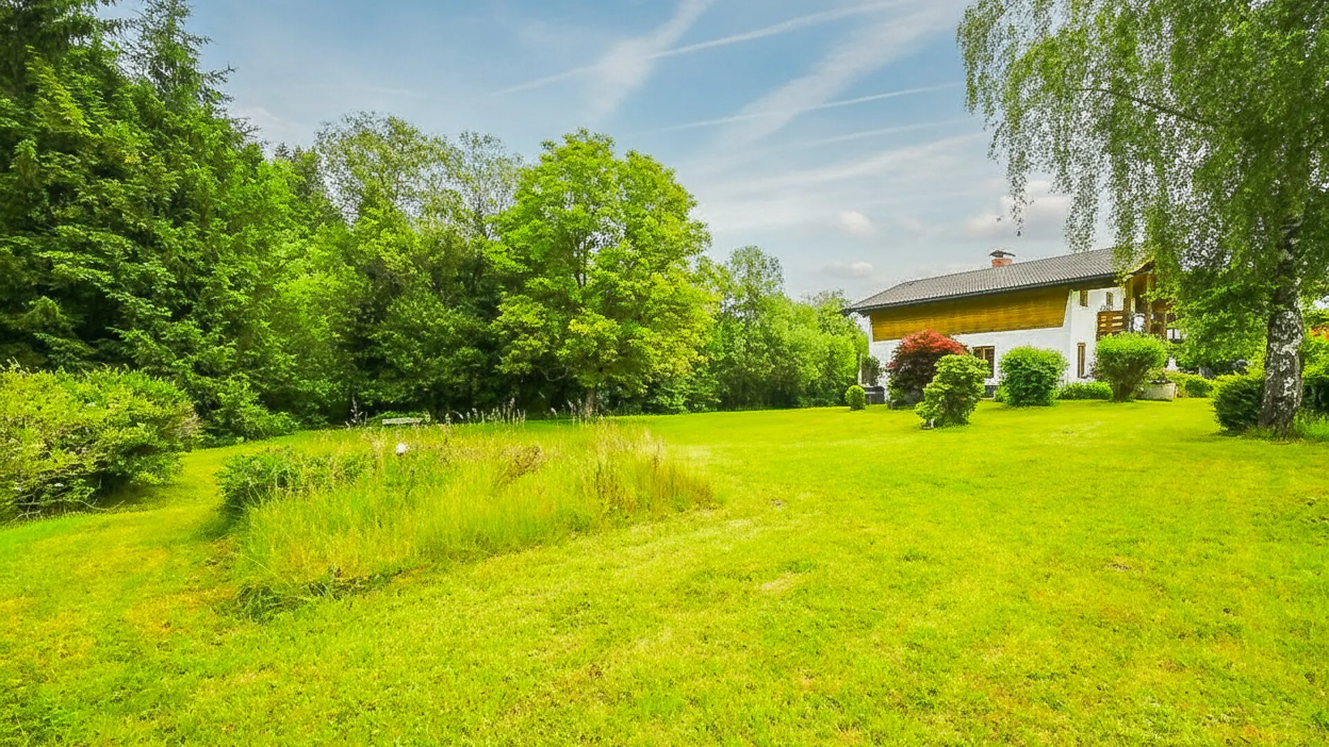 KITZIMMO-Einfamilienhaus mit großem Grundstück kaufen - Immobilien Söll.
