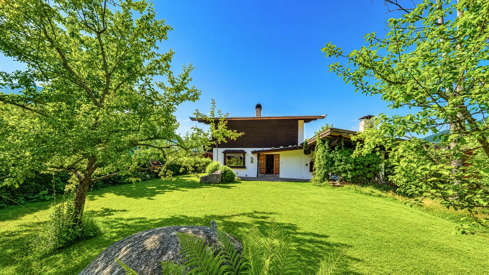 KITZIMMO-Baugrundstück mit Altbestand auf der Bichlalm kaufen - Immobilien Kitzbühel.-1-4-6